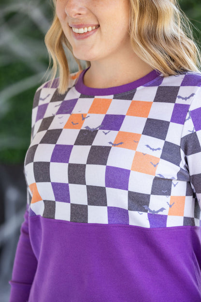 Checkered Bats and Purple