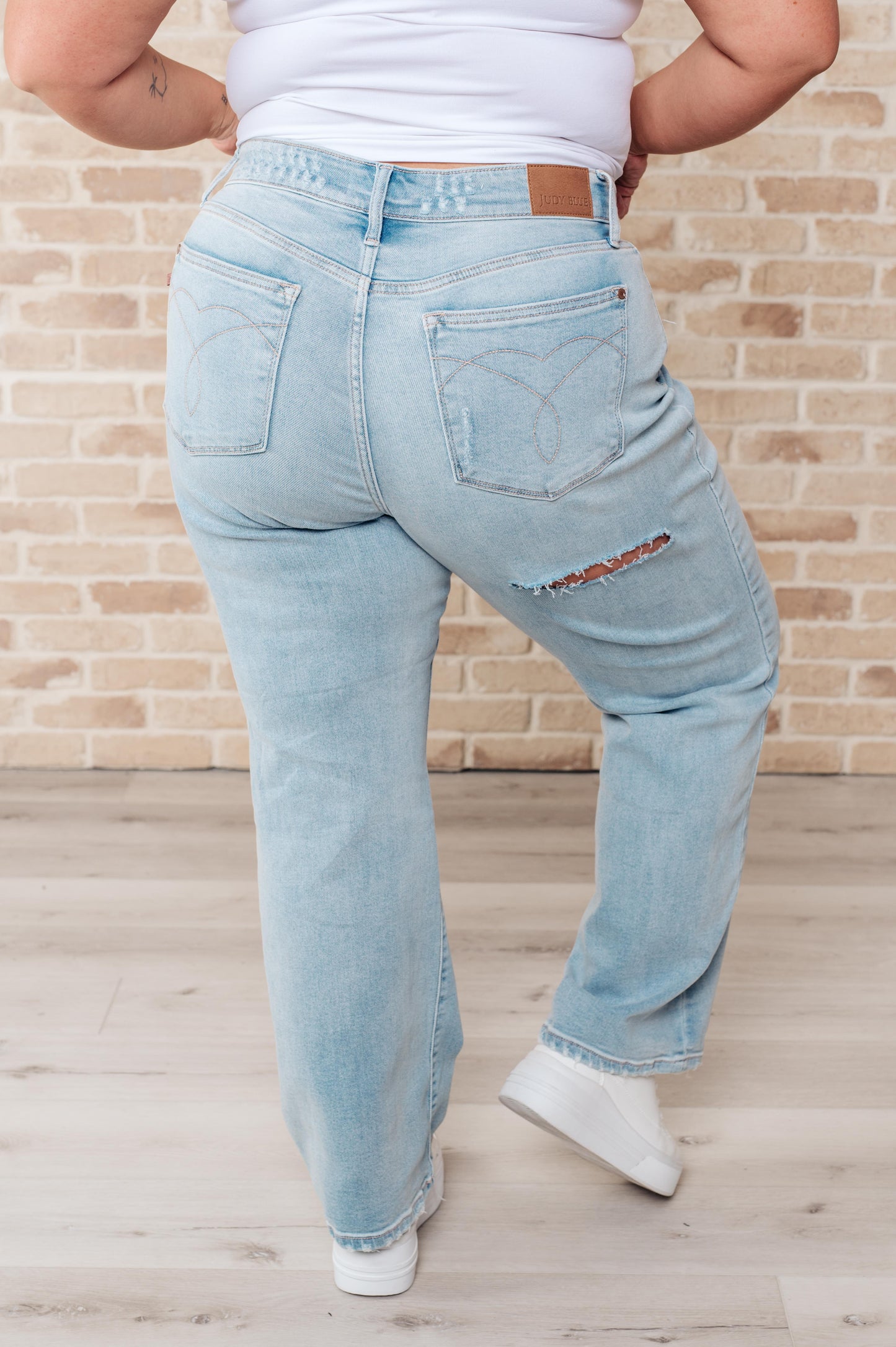 Parker High Rise 90's Straight Jeans (note rip in the back)